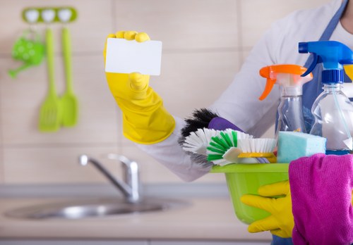 Cleaner working safely with equipment during a routine task