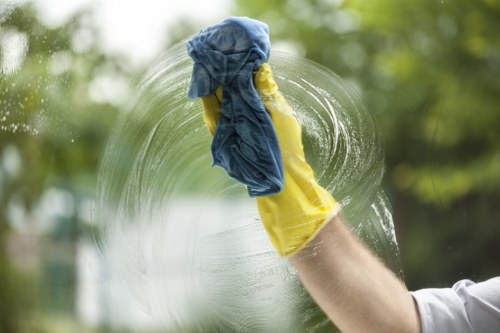 Local cleaners preparing a rental property for final inspection in Belsizepark
