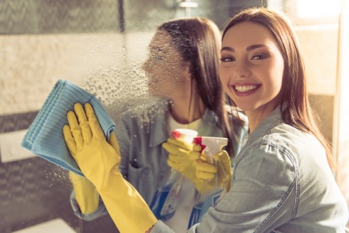 Cleaner preparing a guest-ready flat in Belsizepark